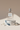 Ocean Breeze Eau De Parfum on marble pedestal with ocean-inspired styling