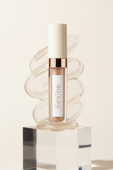 Hydrating Lip Gloss on luxury acrylic pedestal with gloss texture, elegant lifestyle composition