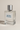 Close-up of Ocean Breeze Eau De Parfum premium glass bottle and matte silver cap