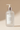 Close-up of Nourishing Body Wash premium frosted bottle and pump